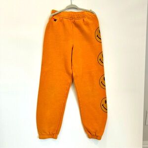 Aviator Nation Orange smiley face pants  size 8
